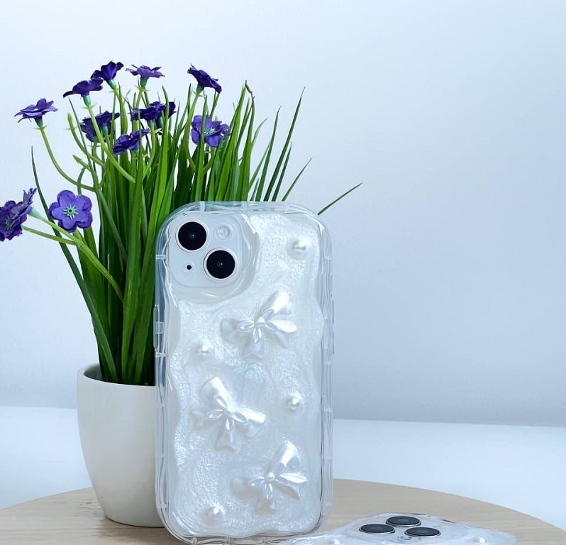 Чохол для iPhone 15 – Soft Waves (Bows & Pearls)