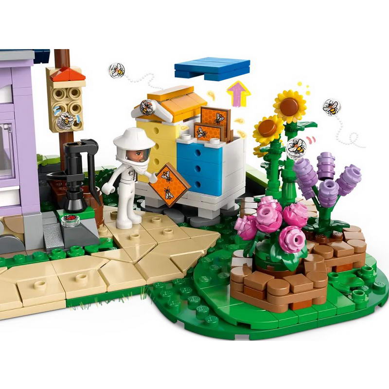 Конструктор Lego Friends Будиночок і квітник бджолярів (42669) - фото 2